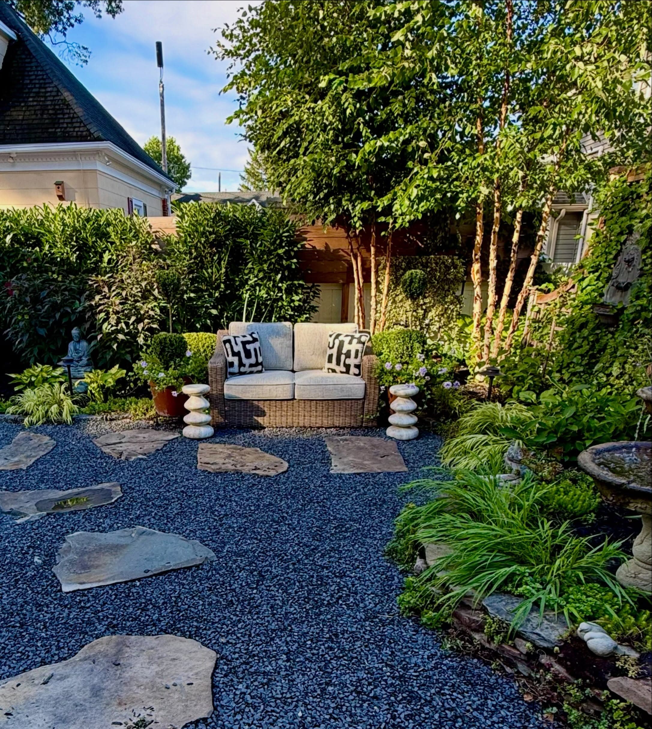 Courtyard finished: gravel court, stepping stones, planting